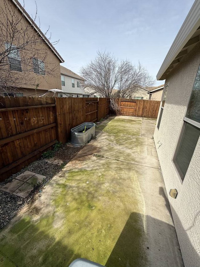 Patio before pressure washing